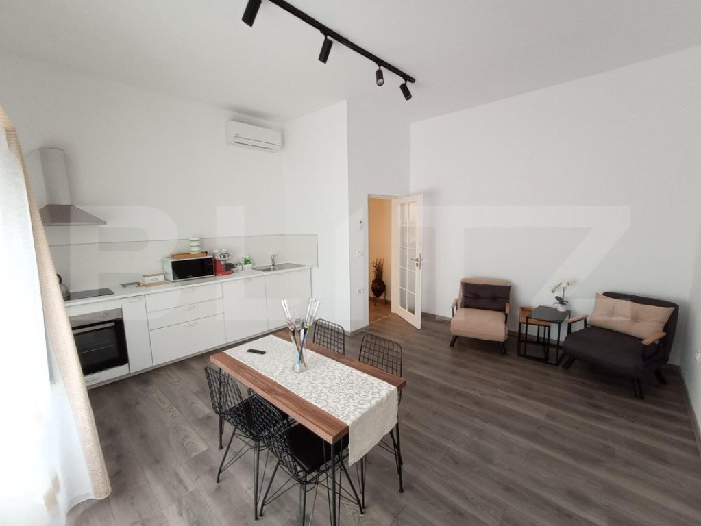 Casa de inchiriat, cu doua apartamente, 150mp utili, cocheta