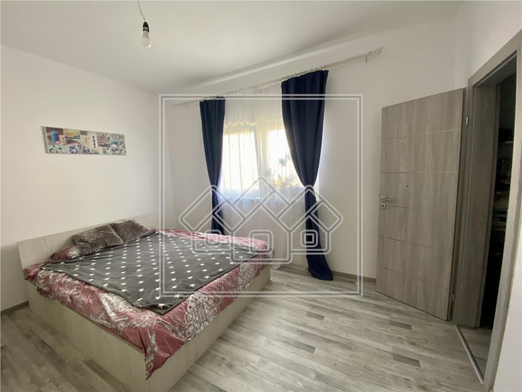 Apartament decomandat cu 3 camere, 2 bai, balcon - 74,5 mp